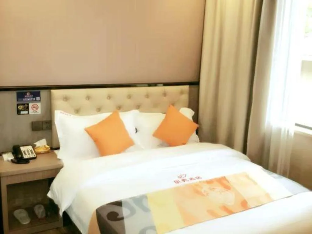 Bed in Shell Hotel Shanghai Jinshan Wanda Plaza