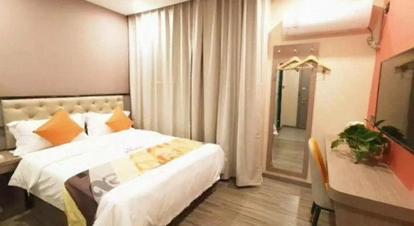 Bed in Shell Hotel Shanghai Jinshan Wanda Plaza