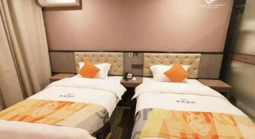 Bed in Shell Hotel Shanghai Jinshan Wanda Plaza
