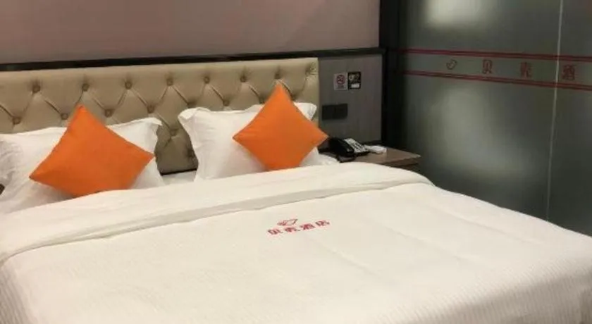 Bed in Shell Hotel Shanghai Jinshan Wanda Plaza
