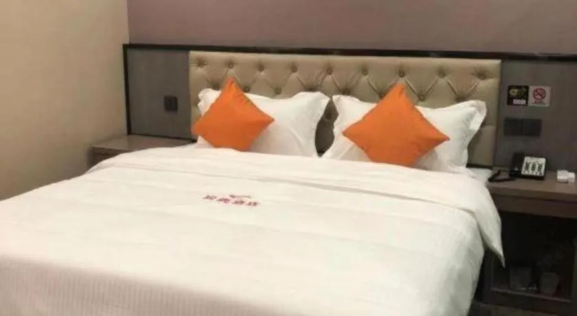 Bed in Shell Hotel Shanghai Jinshan Wanda Plaza