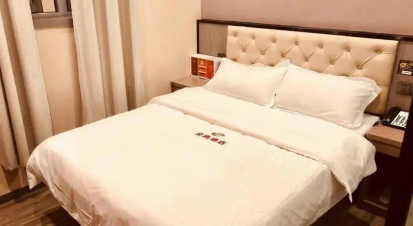 Bed in Shell Hotel Shanghai Jinshan Wanda Plaza