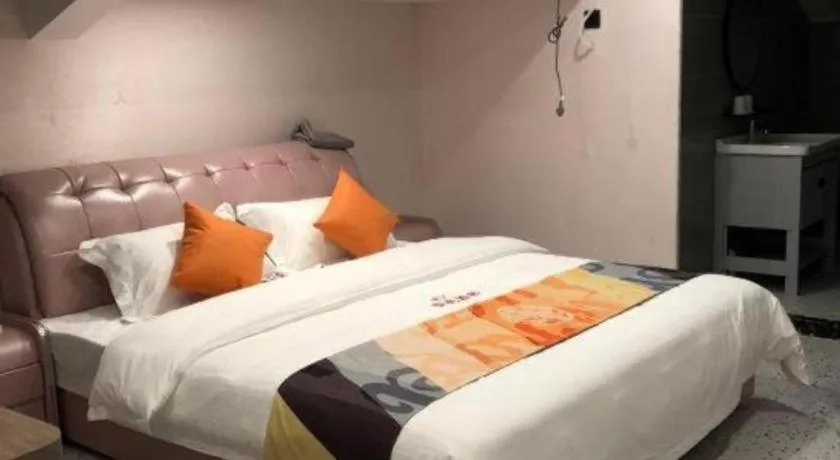 Bed in Shell Hotel Shanghai Jinshan Wanda Plaza