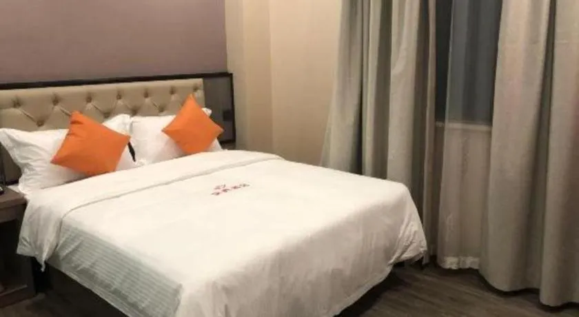 Bed in Shell Hotel Shanghai Jinshan Wanda Plaza