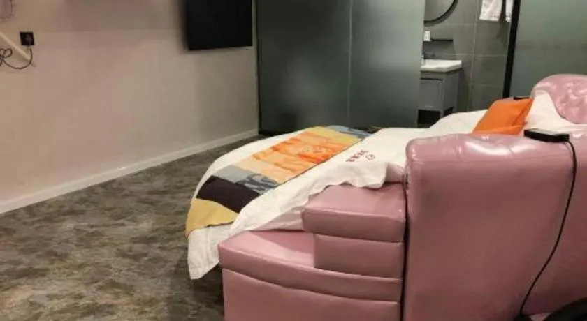 Bed in Shell Hotel Shanghai Jinshan Wanda Plaza