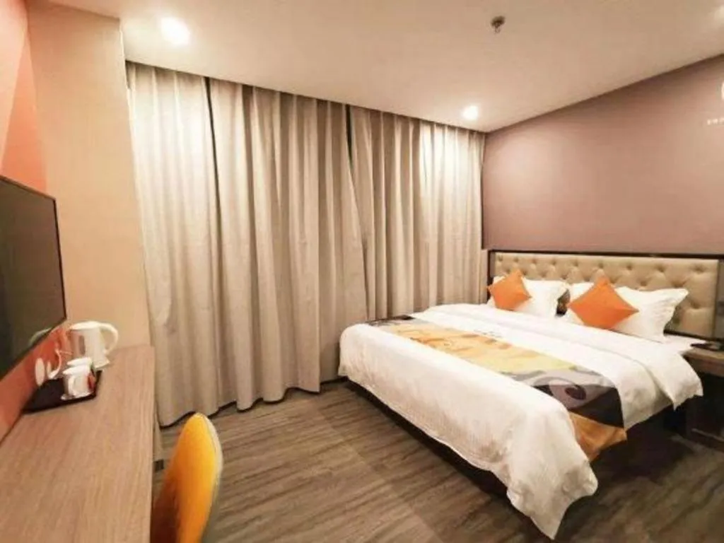 Bed in Shell Hotel Shanghai Jinshan Wanda Plaza