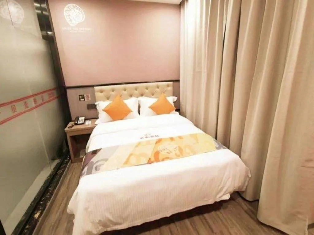 Bed in Shell Hotel Shanghai Jinshan Wanda Plaza