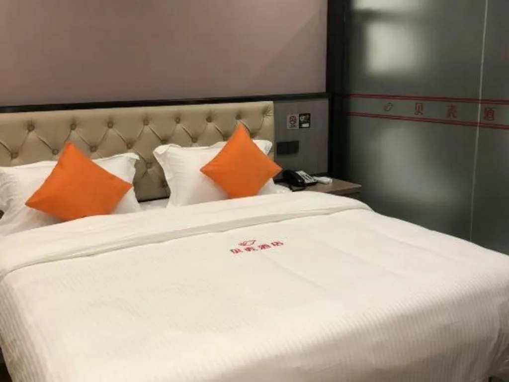 Bed in Shell Hotel Shanghai Jinshan Wanda Plaza