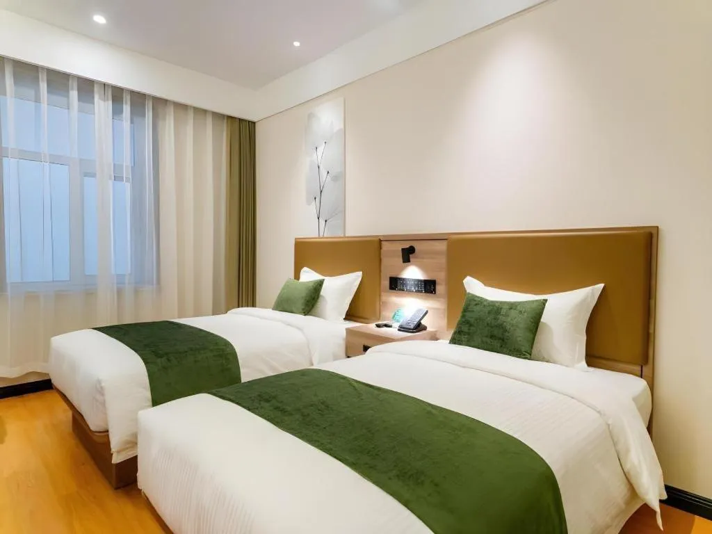 Bed in GreenTree Inn Express Hebei Tangshan Guyan District Xinguang Road