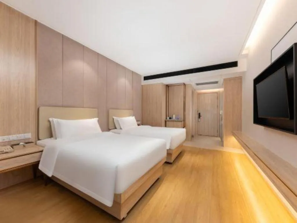 Bed in GreenTree Eastern Hotel Shenzhen Nanshan District Qianhai Free Trade Zone Lilin Metro Station