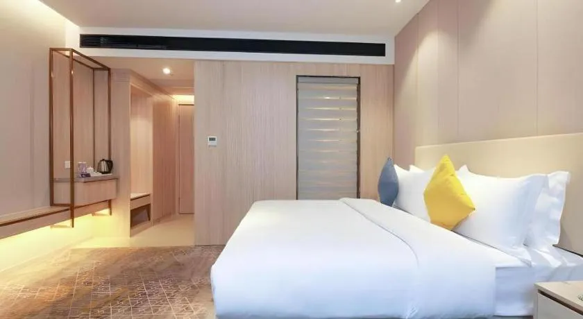 Bed in GreenTree Eastern Hotel Shenzhen Nanshan District Qianhai Free Trade Zone Lilin Metro Station