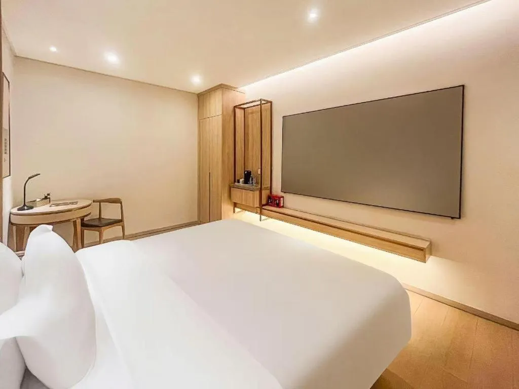 Bed in GreenTree Eastern Hotel Shenzhen Nanshan District Qianhai Free Trade Zone Lilin Metro Station