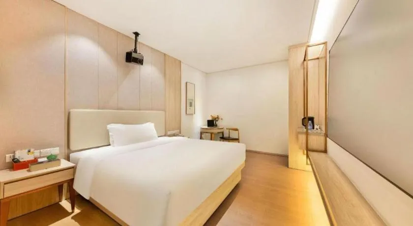 Bed in GreenTree Eastern Hotel Shenzhen Nanshan District Qianhai Free Trade Zone Lilin Metro Station