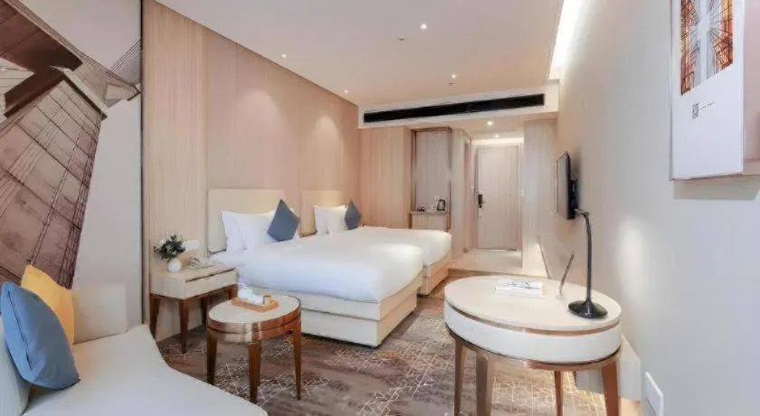 Bed in GreenTree Eastern Hotel Shenzhen Nanshan District Qianhai Free Trade Zone Lilin Metro Station