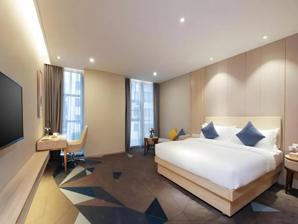 Bed in GreenTree Eastern Hotel Shenzhen Nanshan District Qianhai Free Trade Zone Lilin Metro Station