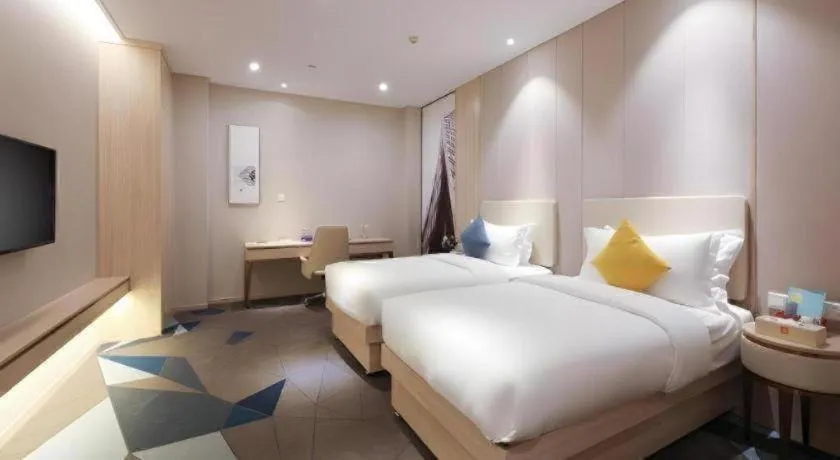 Bed in GreenTree Eastern Hotel Shenzhen Nanshan District Qianhai Free Trade Zone Lilin Metro Station