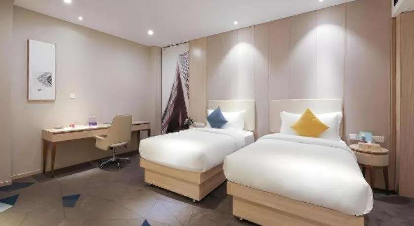 Bed in GreenTree Eastern Hotel Shenzhen Nanshan District Qianhai Free Trade Zone Lilin Metro Station