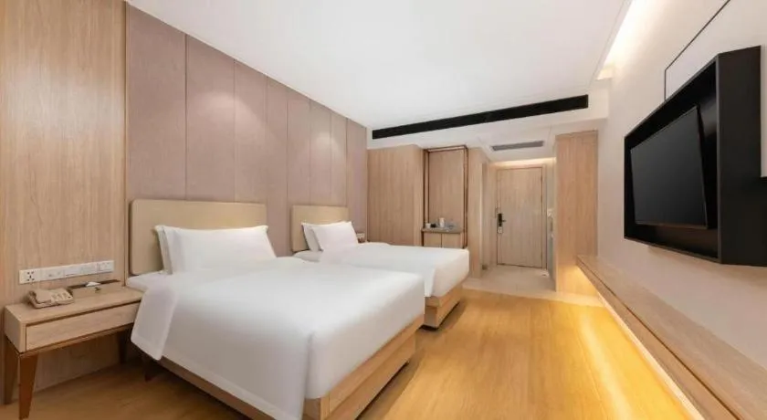 Bed in GreenTree Eastern Hotel Shenzhen Nanshan District Qianhai Free Trade Zone Lilin Metro Station