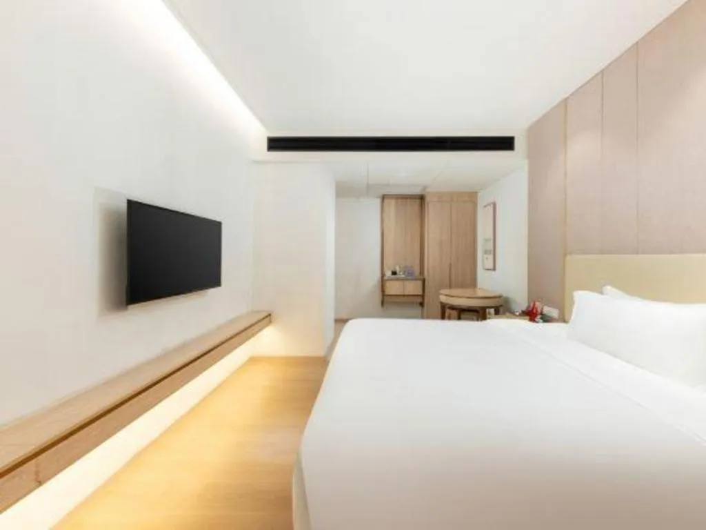 Bed in GreenTree Eastern Hotel Shenzhen Nanshan District Qianhai Free Trade Zone Lilin Metro Station