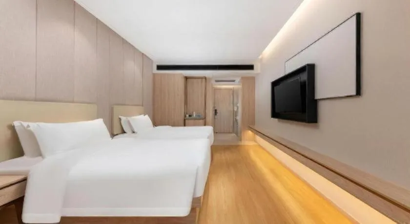 Bed in GreenTree Eastern Hotel Shenzhen Nanshan District Qianhai Free Trade Zone Lilin Metro Station