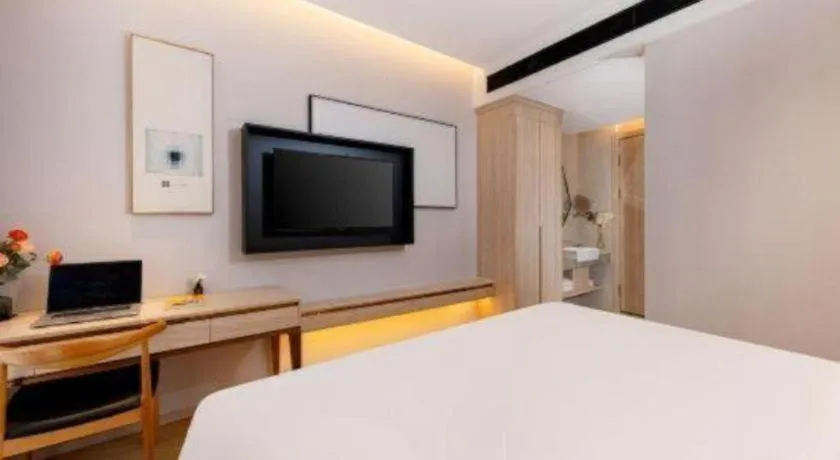 Bed in GreenTree Eastern Hotel Shenzhen Nanshan District Qianhai Free Trade Zone Lilin Metro Station