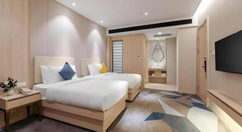 Bed in GreenTree Eastern Hotel Shenzhen Nanshan District Qianhai Free Trade Zone Lilin Metro Station