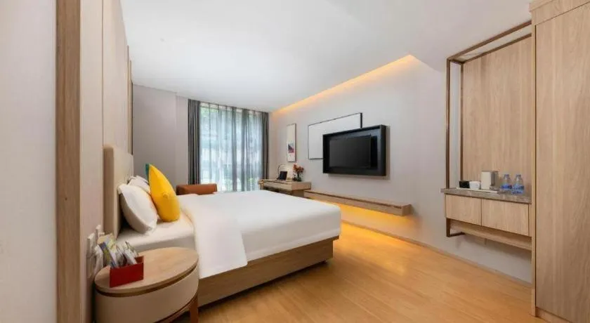 Bed in GreenTree Eastern Hotel Shenzhen Nanshan District Qianhai Free Trade Zone Lilin Metro Station