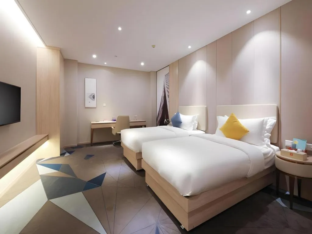 Bed in GreenTree Eastern Hotel Shenzhen Nanshan District Qianhai Free Trade Zone Lilin Metro Station