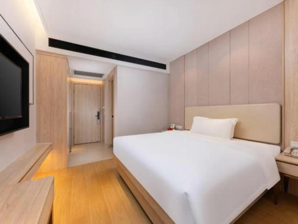 Bed in GreenTree Eastern Hotel Shenzhen Nanshan District Qianhai Free Trade Zone Lilin Metro Station