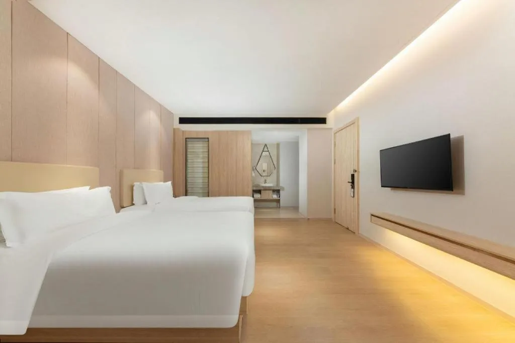 Bed in GreenTree Eastern Hotel Shenzhen Nanshan District Qianhai Free Trade Zone Lilin Metro Station