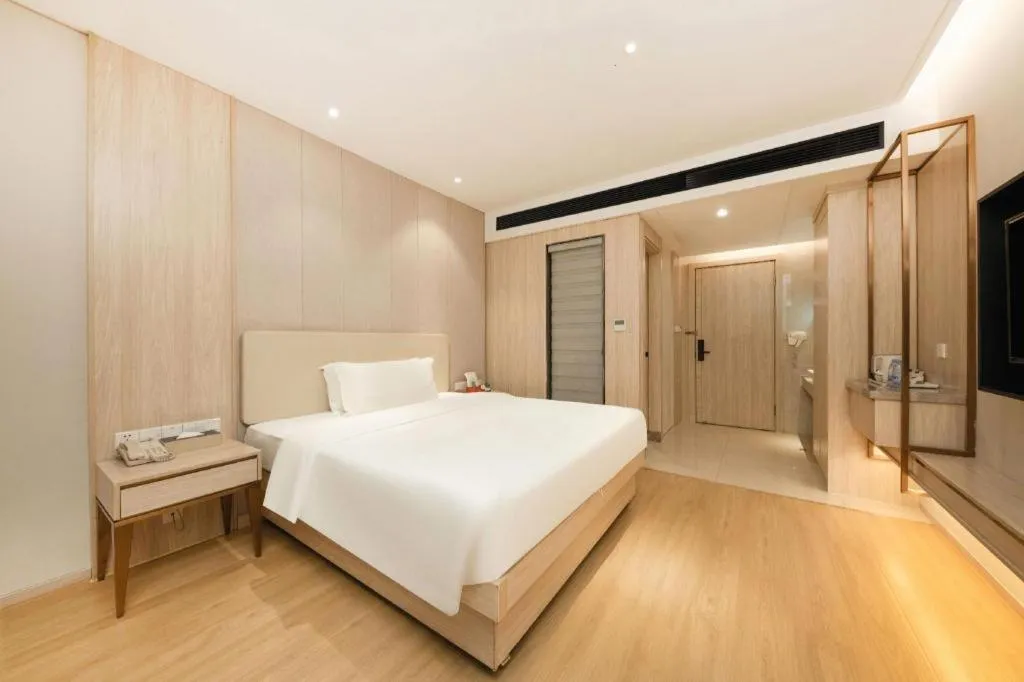 Bed in GreenTree Eastern Hotel Shenzhen Nanshan District Qianhai Free Trade Zone Lilin Metro Station