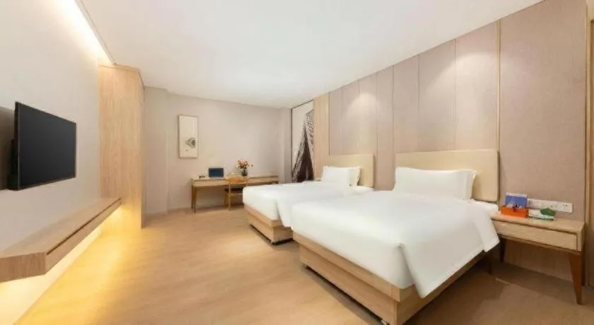 Bed in GreenTree Eastern Hotel Shenzhen Nanshan District Qianhai Free Trade Zone Lilin Metro Station