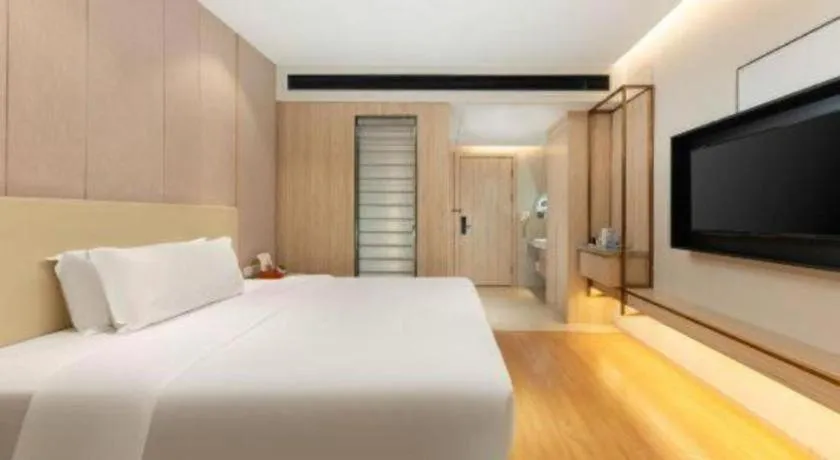 Bed in GreenTree Eastern Hotel Shenzhen Nanshan District Qianhai Free Trade Zone Lilin Metro Station