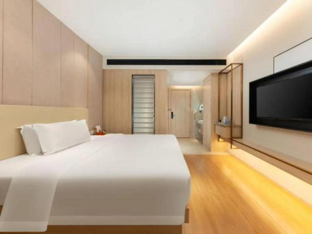 Bed in GreenTree Eastern Hotel Shenzhen Nanshan District Qianhai Free Trade Zone Lilin Metro Station