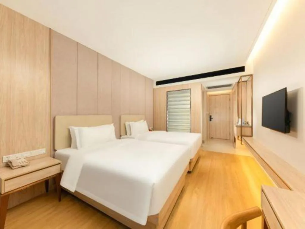 Bed in GreenTree Eastern Hotel Shenzhen Nanshan District Qianhai Free Trade Zone Lilin Metro Station