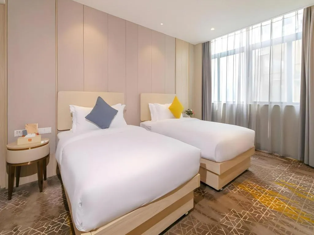 Bed in GreenTree Eastern Hotel Shenzhen Nanshan District Qianhai Free Trade Zone Lilin Metro Station