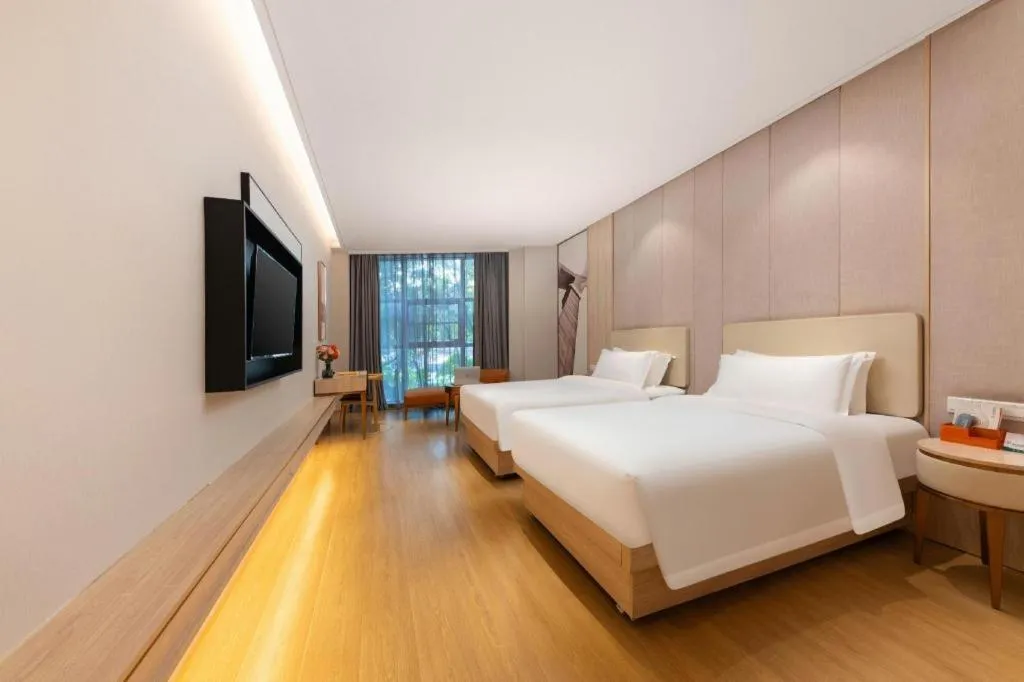 Bed in GreenTree Eastern Hotel Shenzhen Nanshan District Qianhai Free Trade Zone Lilin Metro Station