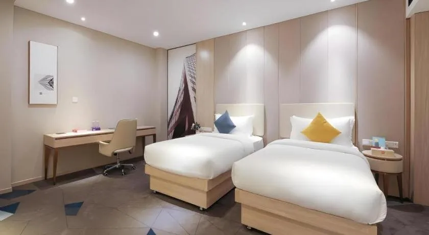 Bed in GreenTree Eastern Hotel Shenzhen Nanshan District Qianhai Free Trade Zone Lilin Metro Station