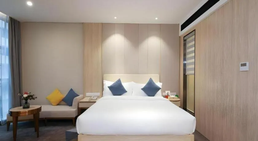 Bed in GreenTree Eastern Hotel Shenzhen Nanshan District Qianhai Free Trade Zone Lilin Metro Station