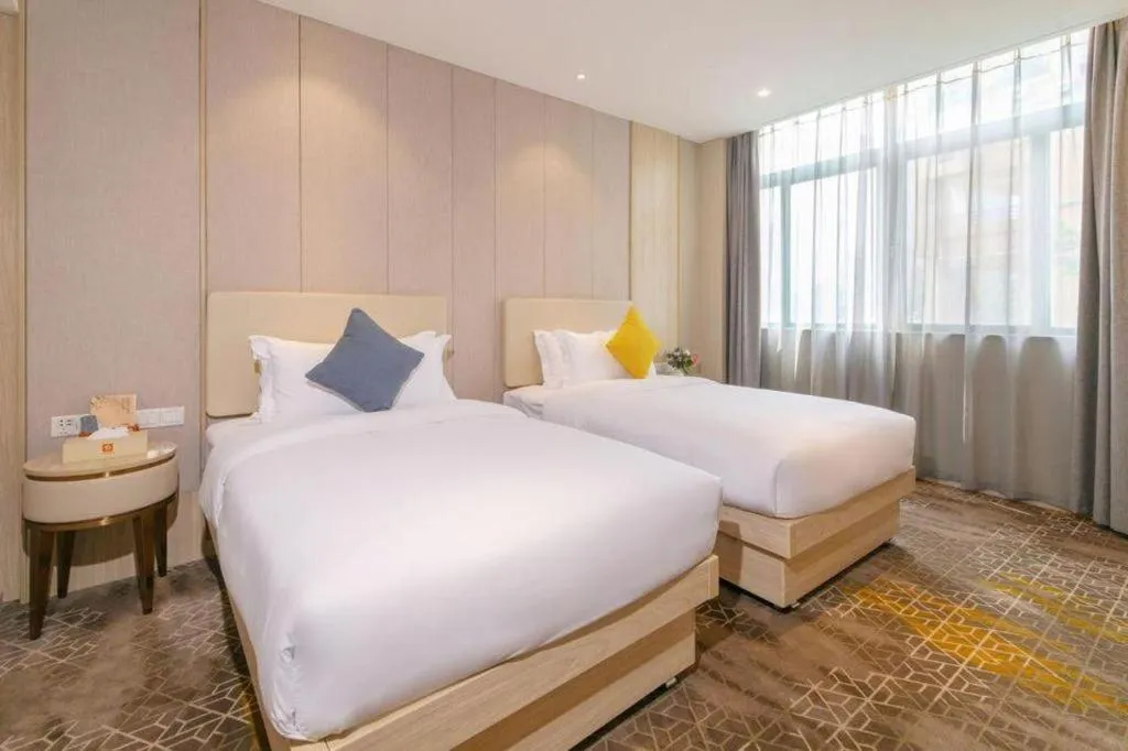 Bed in GreenTree Eastern Hotel Shenzhen Nanshan District Qianhai Free Trade Zone Lilin Metro Station