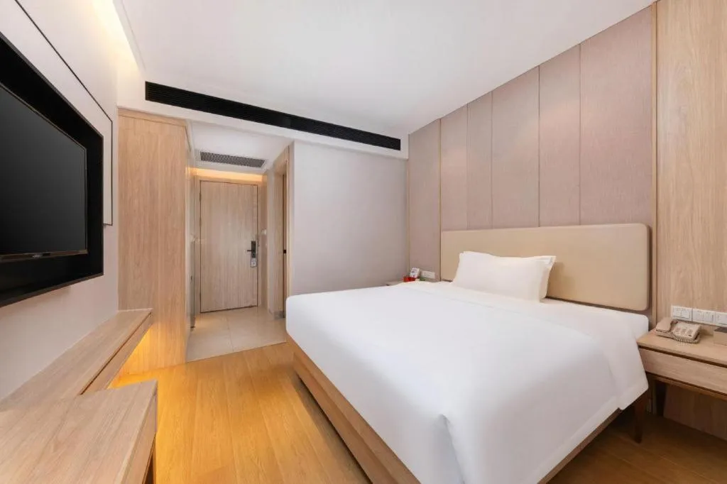 Bed in GreenTree Eastern Hotel Shenzhen Nanshan District Qianhai Free Trade Zone Lilin Metro Station