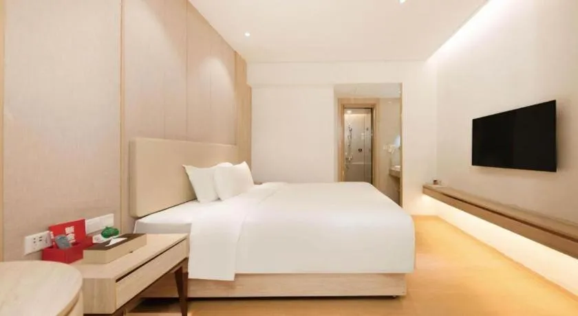 Bed in GreenTree Eastern Hotel Shenzhen Nanshan District Qianhai Free Trade Zone Lilin Metro Station