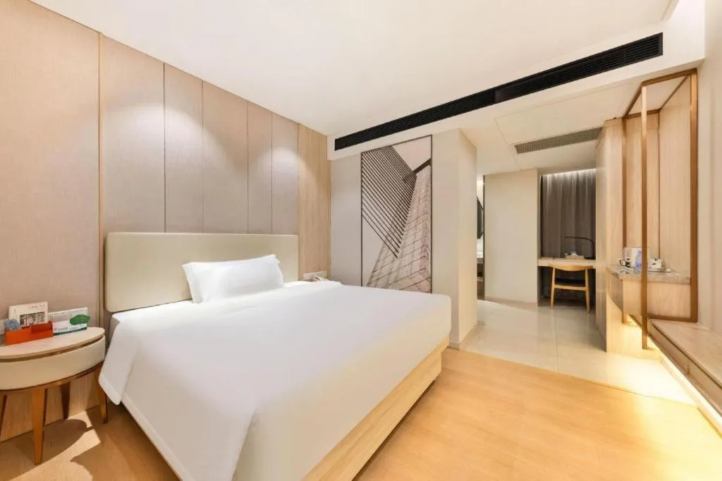 Bed in GreenTree Eastern Hotel Shenzhen Nanshan District Qianhai Free Trade Zone Lilin Metro Station