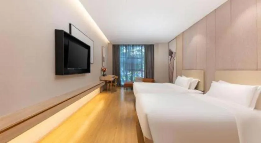 Bed in GreenTree Eastern Hotel Shenzhen Nanshan District Qianhai Free Trade Zone Lilin Metro Station