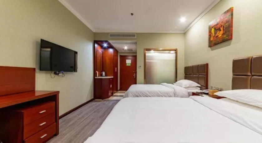 Bed in GreenTree Alliance Hotel Yancheng Engineering College Dayangwan Scenic Area