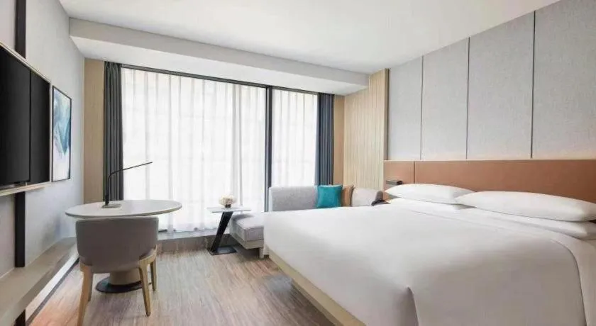 Bed in GreenTree Alliance Hotel Yancheng Engineering College Dayangwan Scenic Area