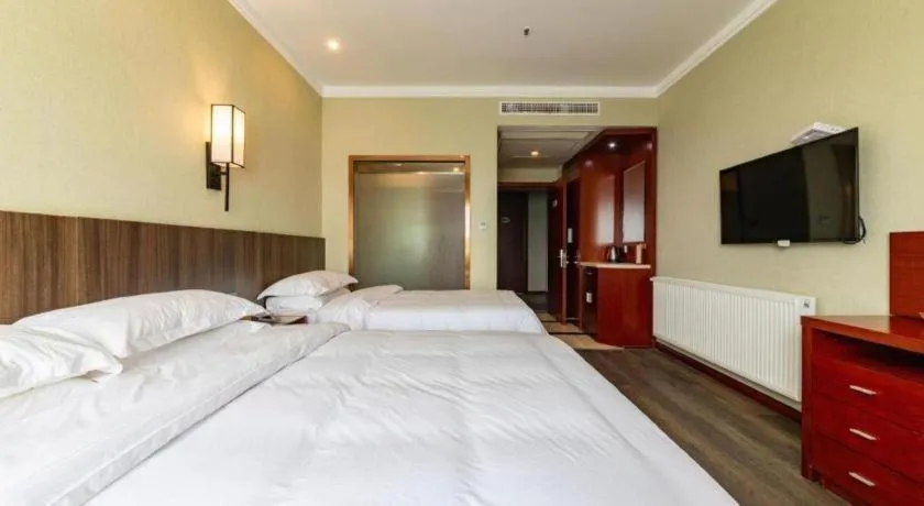 Bed in GreenTree Alliance Hotel Yancheng Engineering College Dayangwan Scenic Area