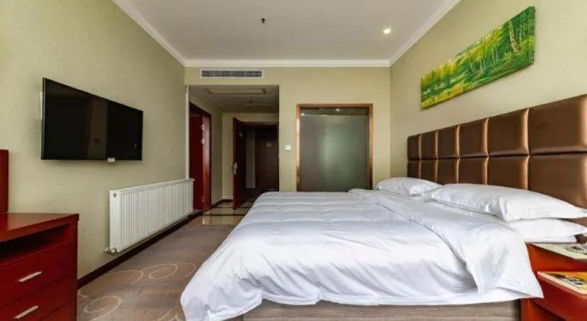 Bed in GreenTree Alliance Hotel Yancheng Engineering College Dayangwan Scenic Area