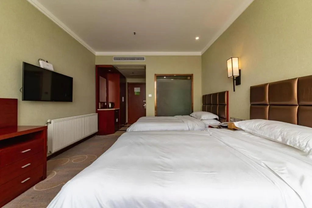 Bed in GreenTree Alliance Hotel Yancheng Engineering College Dayangwan Scenic Area