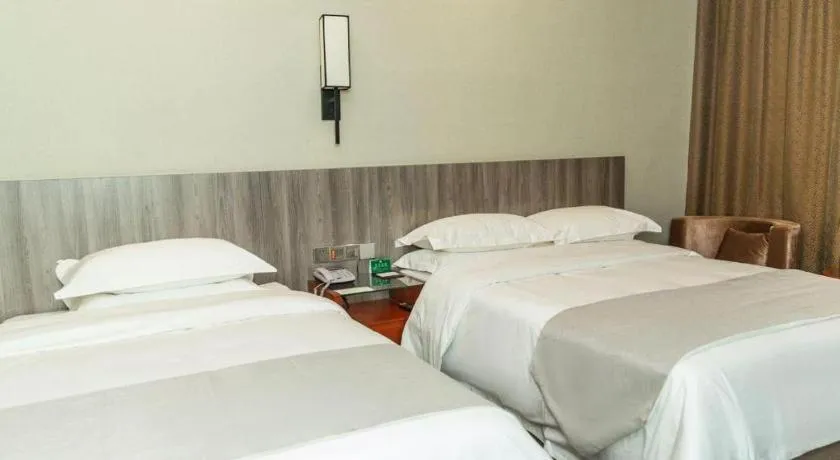 Bed in GreenTree Alliance Hotel Yancheng Engineering College Dayangwan Scenic Area